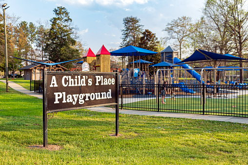 Prattville, Alabama, USA-March 7, 2023: A Child's Place Playground in downtown Prattville after its revitalization and replacement of play equipment the previous year.