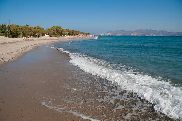Beach on the coast of Kos island, Greece. View on Turkish side.