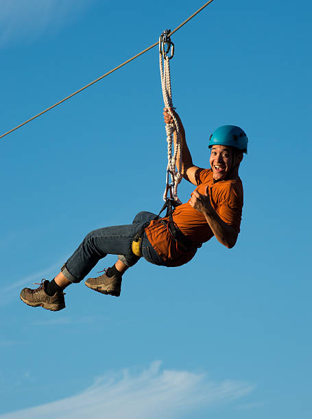 Riding on Canopy Tour  canopy tour photos stock pictures, royalty-free photos & images
