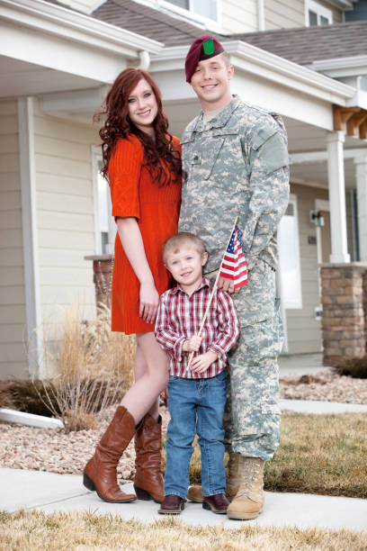 istock Army Family Series: Real American Soldier With Wife & Son 157718866