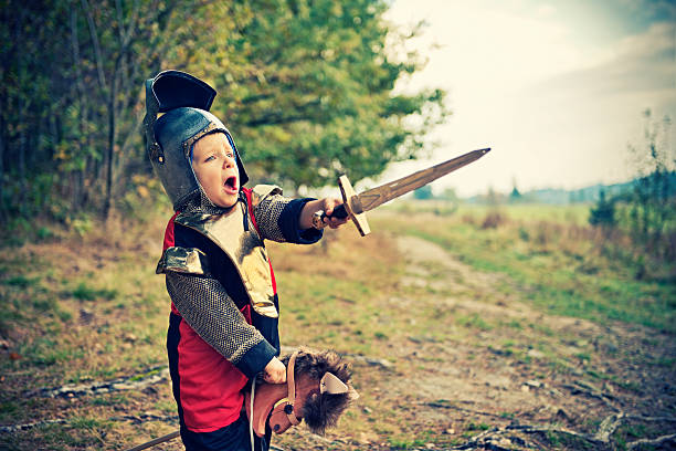 Battle in the wood Brave little knight ordering his fellow knights to charge at the enemy lines. animals charging stock pictures, royalty-free photos & images