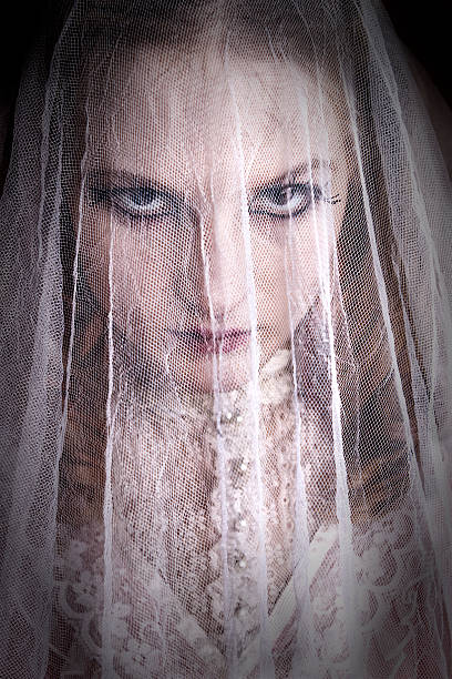 Creepy Bride Under Crumpled Veil  scary bride stock pictures, royalty-free photos & images