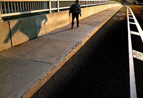 Person walking at sunset Toronto Canada