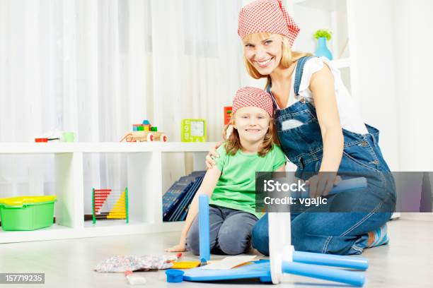 Happy Young Family Repair Furniture At Home Stock Photo - Download Image Now - Activity, Adult, Art And Craft