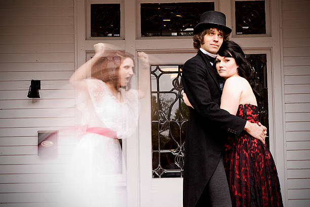 istock Ghost Angrily Runs Toward Couple Embracing 157719305