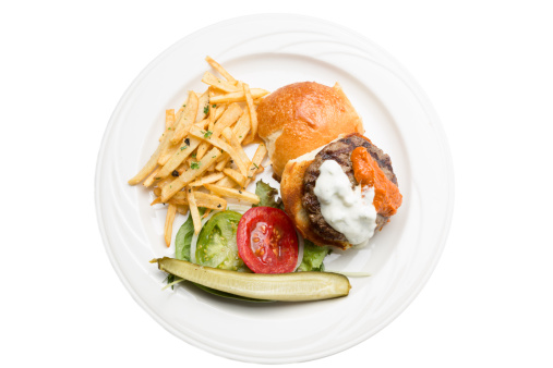 Gourmet Hamburger and Fries isolated on white