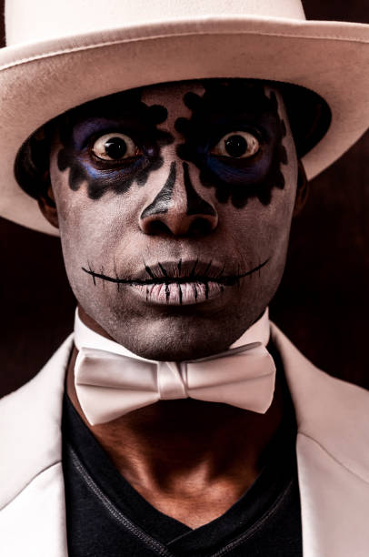 istock Black man with Sugar Skull makeup on his face (II) 157719382