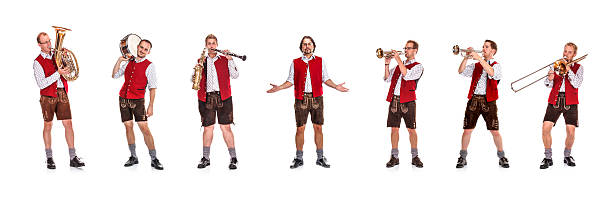 Bavarian / Austrian Brass Band Bavarian/Austrian brass band with band leader. traditional clothing photos stock pictures, royalty-free photos & images