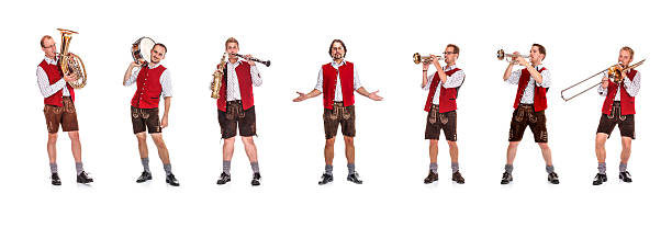 Bavarian / Austrian Brass Band Bavarian/Austrian brass band with band leader. Lederhosen stock pictures, royalty-free photos & images