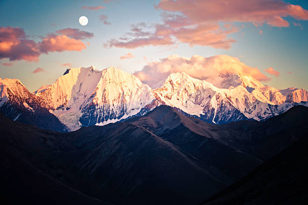 istock Mountain peak in sunset with moonrise 157719754