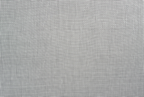 A close-up of a window screen.
