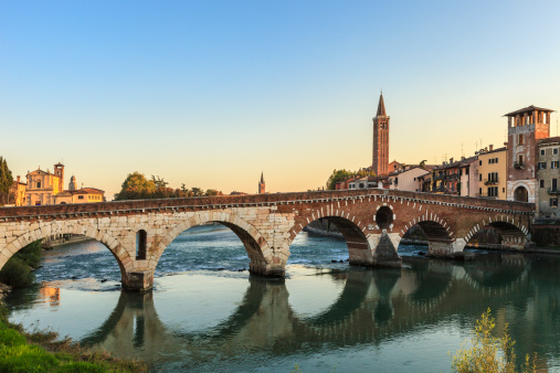 The old Ponte Pietra is a five-arched bridge that crosses the river Adige and is a valuable evidence of the Roman period. Verona, Italy.