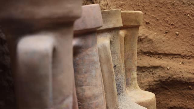 Upper Parts of Large Old Clay Jugs Close-up, Moving Focus