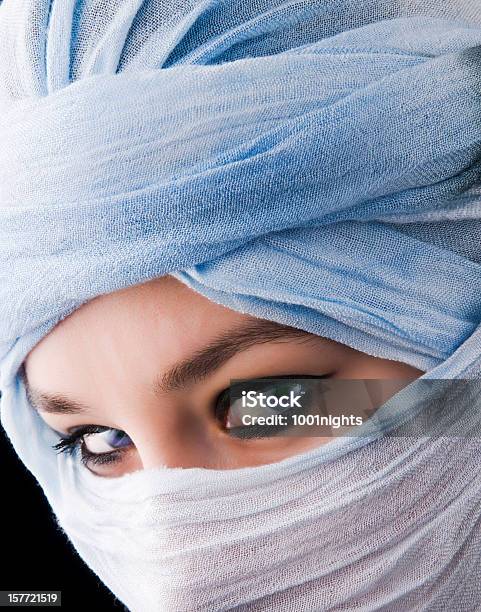 Mytserious Blue Eyes Behind Tuareg Stock Photo - Download Image Now - Tuareg Tribe, Women, Blue Eyes