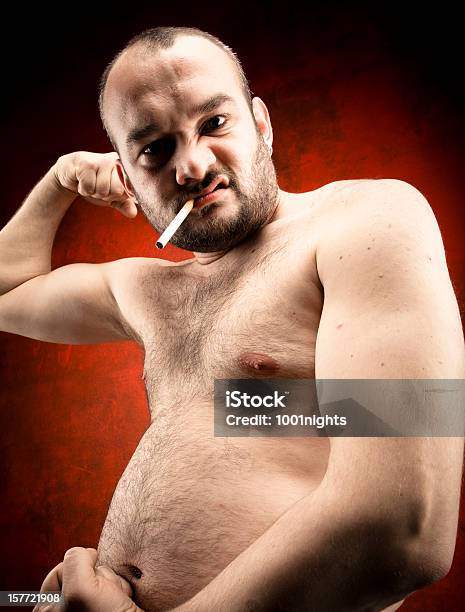 Photo libre de droit de Gros Homme Avec Cigarette banque d'images et plus d'images libres de droit de Hommes - Hommes, Torse nu, Fumer du tabac