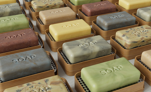 Realistic 3D rendered bars of craft soap on bamboo dish on white textured background.