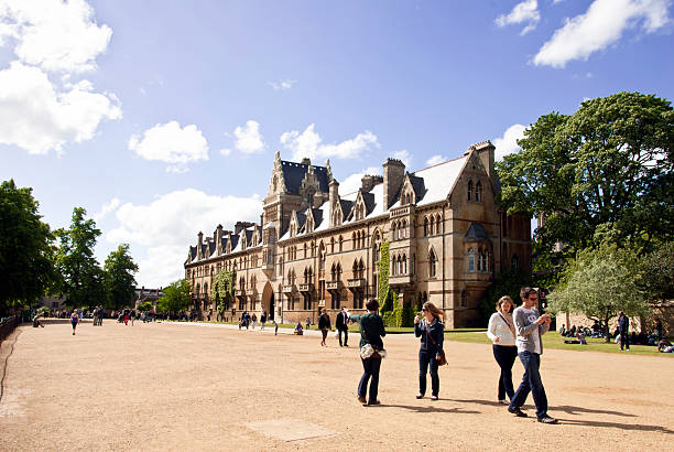 Oxford ,England - May 8, 2011: Christ church college in Oxford, England, one of many University buildings in Oxford, England. Students and tourists walk around the outside.