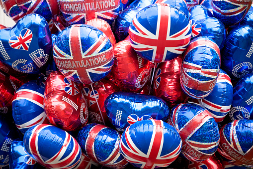 London, United Kingdom - February 26, 2024: Commemorative London and English flag woolen beanies