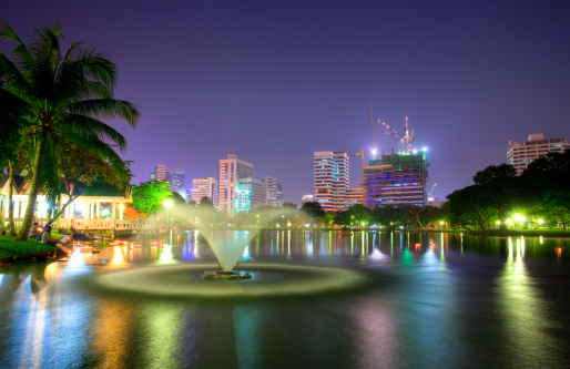Lumpini park during Loy Krathong festival in Bangkok. Krathong are decorated, lighted and put on a river or lake to pray respect for the spirit of waters