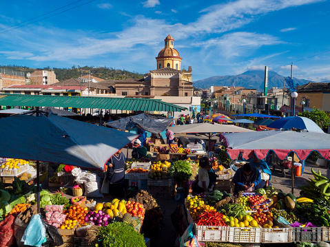 Display of fruits and vegetables in a traditional Colombian market square