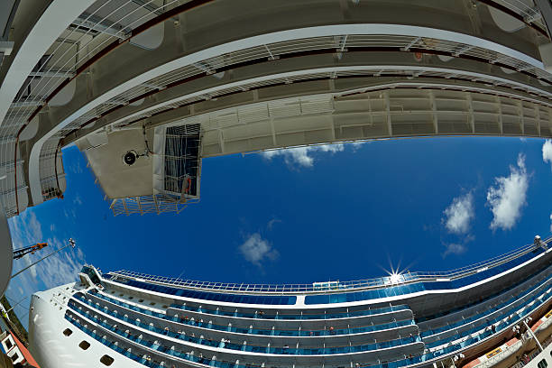 Cozumel, Mexico-March 8,2018: Two cruise ships are docked in Cozumel, Mexico, which is a popular cruise ship destination. Passengers are seen here returning to their ships after a day sightseeing.