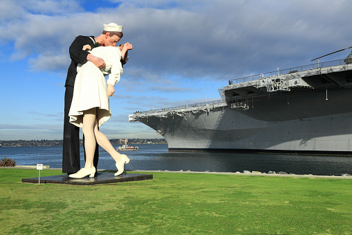 San Diego, California, USA - January 26, 2008:  &ldquo;Unconditional Surrender,&rdquo; a 25-foot, 6,000 pound statue by world-renowned artist J. Seward Johnson commemorating a famous World War II photo was unveiled Feb. 10 at Mole Park in San Diego. Unconditional Surrender is a three-dimensional interpretation of a photo taken by Alfred Eisenstaedt of a Sailor kissing a nurse in Times Square, New York City on Aug. 14, 1945, following the announcement of V-J Day.