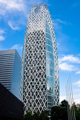 An exterior view of an old landmark in daylight in cloudy sky background