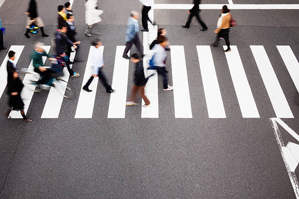 東京で日本の歩行者横断歩道 - crosswalk crowd activity long exposure ストックフォトと画像