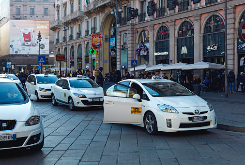 Taxis parked in front of the Barcelona-Sants train station on a sunny day. Catalonia. Spain. August 15, 2023.