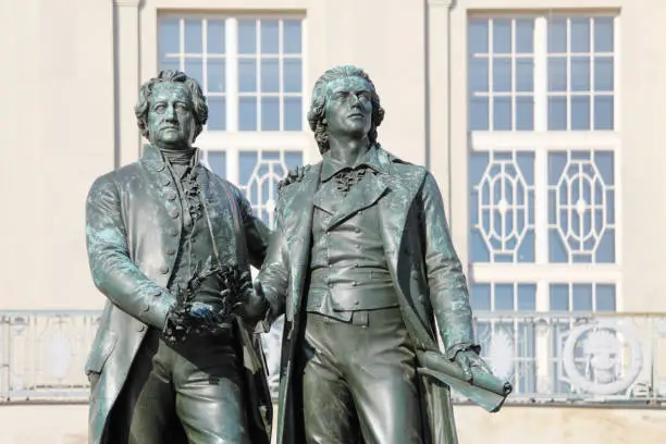 statue of poets Goethe and Schiller in Weimar at the Goethe Monument from 1857 and artist Ernst Rietschel