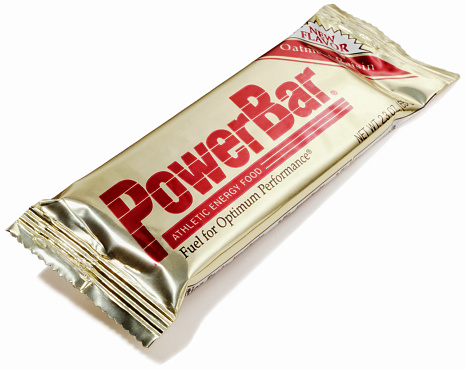 Chocolate bar with foil wrapped on white background