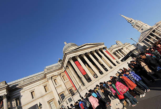 Great Russell Street, London, England, United Kingdom, Europe - November 10th 2025: The facade of the British Museum is in neoclassical style with imitated Greek and Roman columns. The museum is popular among tourists, partly because admission is free and partly because it houses some of the world’s finest collections, especially of Egyptian artifacts.