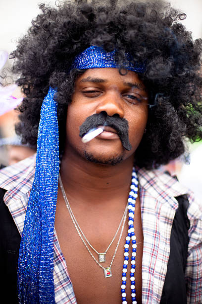 Limassol, Cyprus, March 17th, 2024: Portrait of naughty man in blue costume having fun at Grand Carnival Parade