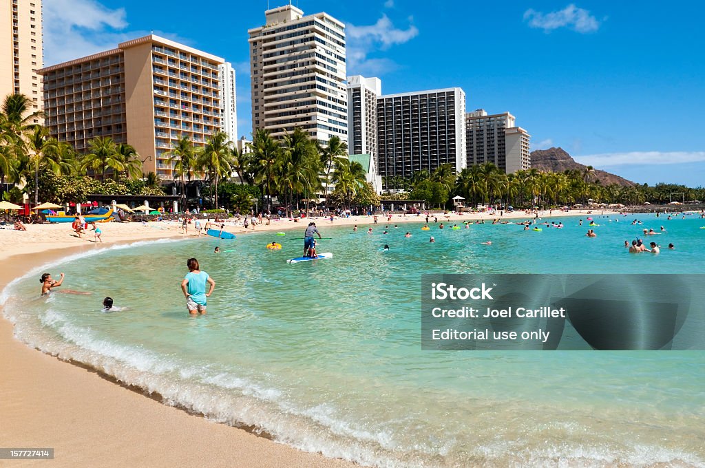 Plage de Waikiki à Hawaï - Photo de Bain de soleil libre de droits