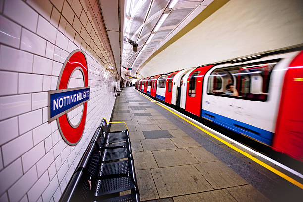 The picture shows the staircase of the tube station at Piccadilly Circus in rainy weather.