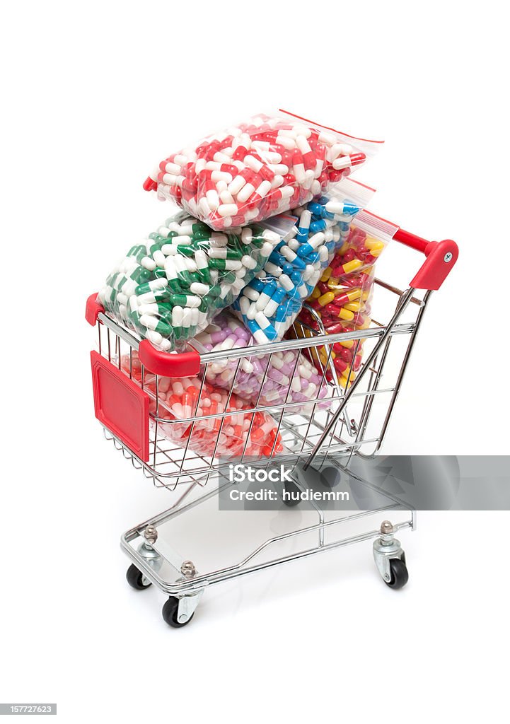 Cápsulas en cesta de compras - Foto de stock de Analgésico libre de derechos