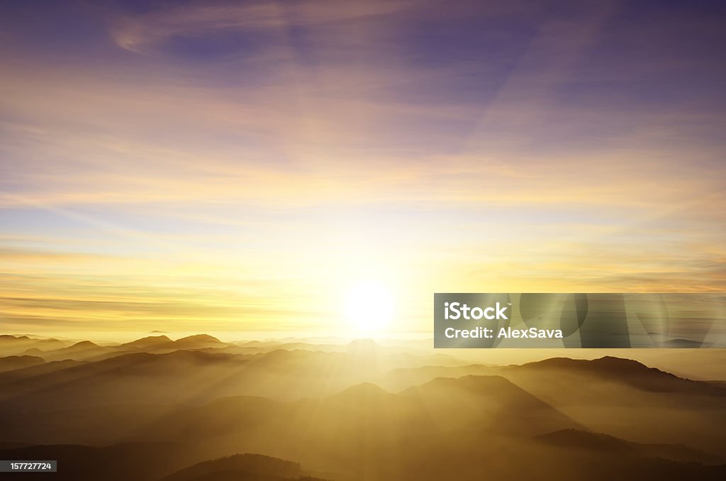 sunset sunset over mountains Sunset Stock Photo