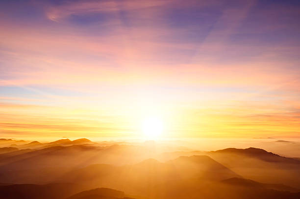 sunset sunset over mountains early morning stock pictures, royalty-free photos & images