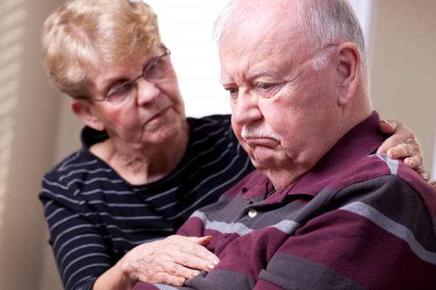 istock Depressed senior man with caring spouse 157727756