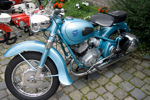 Split, Croatia - July 25, 2023: Motorcycles in a street car park in Split, Croatia.