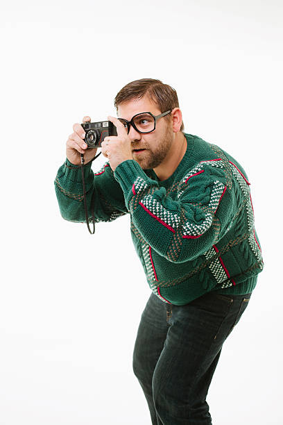 Nerdy sweater photographer stock photo