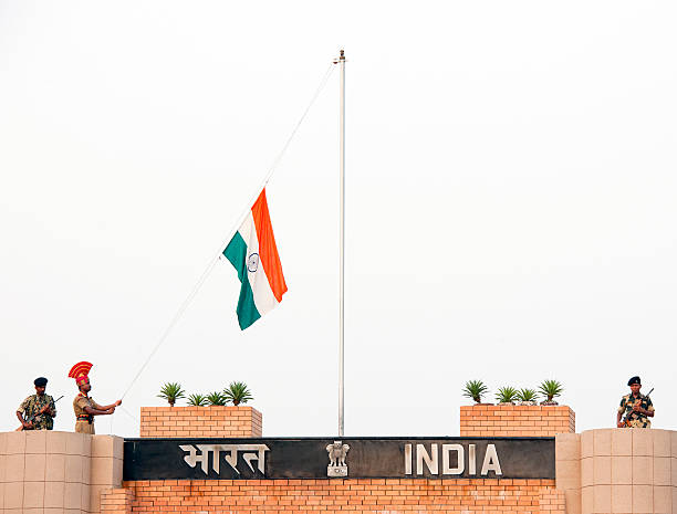 Indian Soldiers Lowering Flag Wagah indian soldier stock pictures, royalty-free photos & images