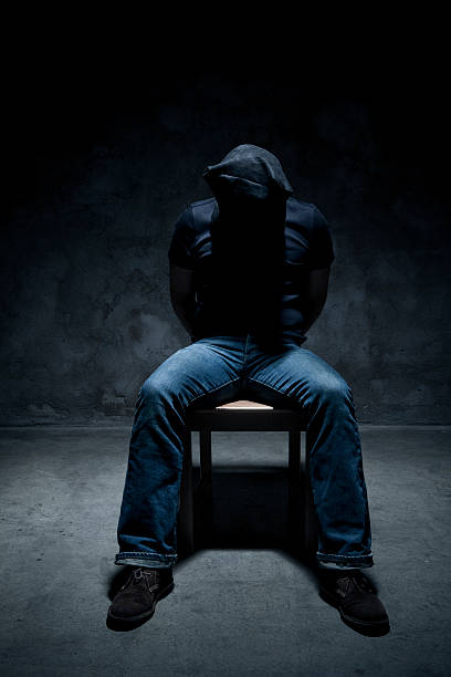 Kidnapping Kidnapped man in a dark room torture photos stock pictures, royalty-free photos & images