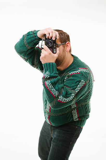 Nerdy man photographer stock photo