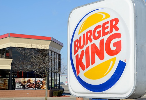 August 19, 2019 San Mateo / CA / USA - Burger King fast food restaurant entrance, advertising several offers among which the Impossible Whopper, a new vegan burger supplied by Impossible Foods