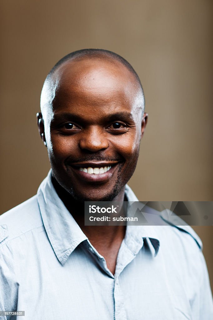 Confident male Close up portrait of confident male smiling and looking at camera. 30-39 Years Stock Photo