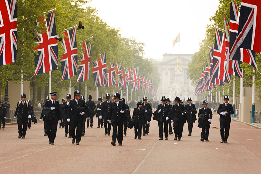 London, United Kingdom - May 29, 2023:  changing of the guard parade in London. People are watching from the  sides.
