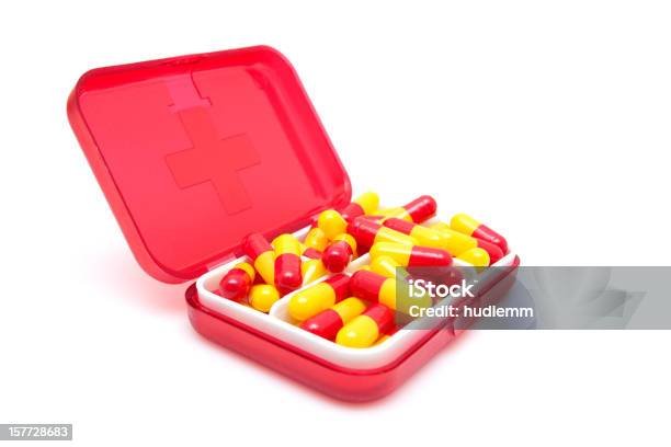 Capsules In Medicine Box Isolated On White Background Stock Photo - Download Image Now