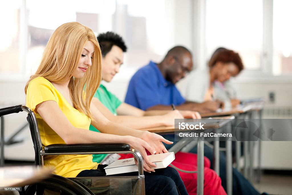 Student with wheelchair A university student in a wheelchair. 18-19 Years Stock Photo