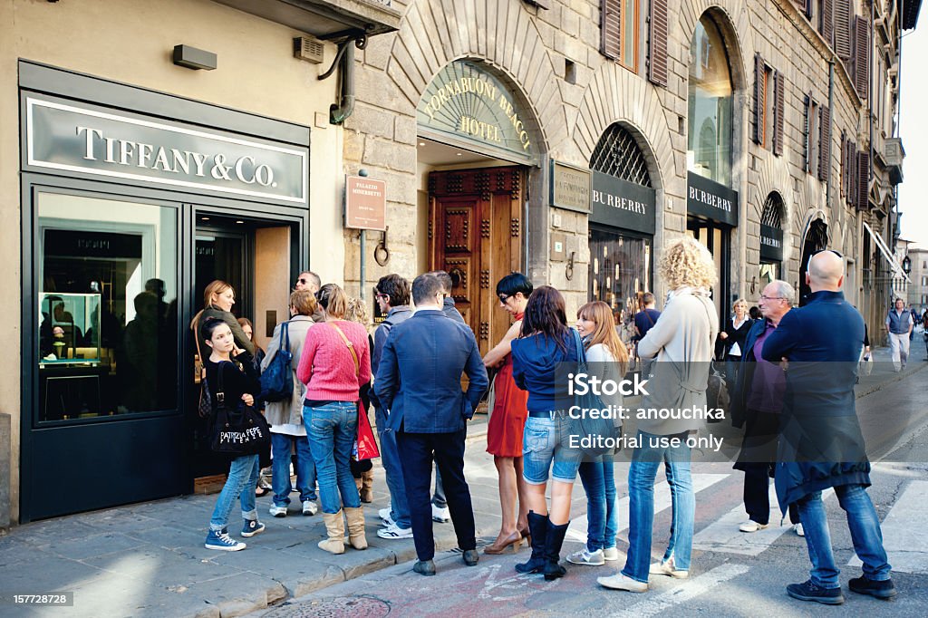 People standing in Queue, Tiffany & Co Shop, Florence, Italy  Waiting In Line Stock Photo